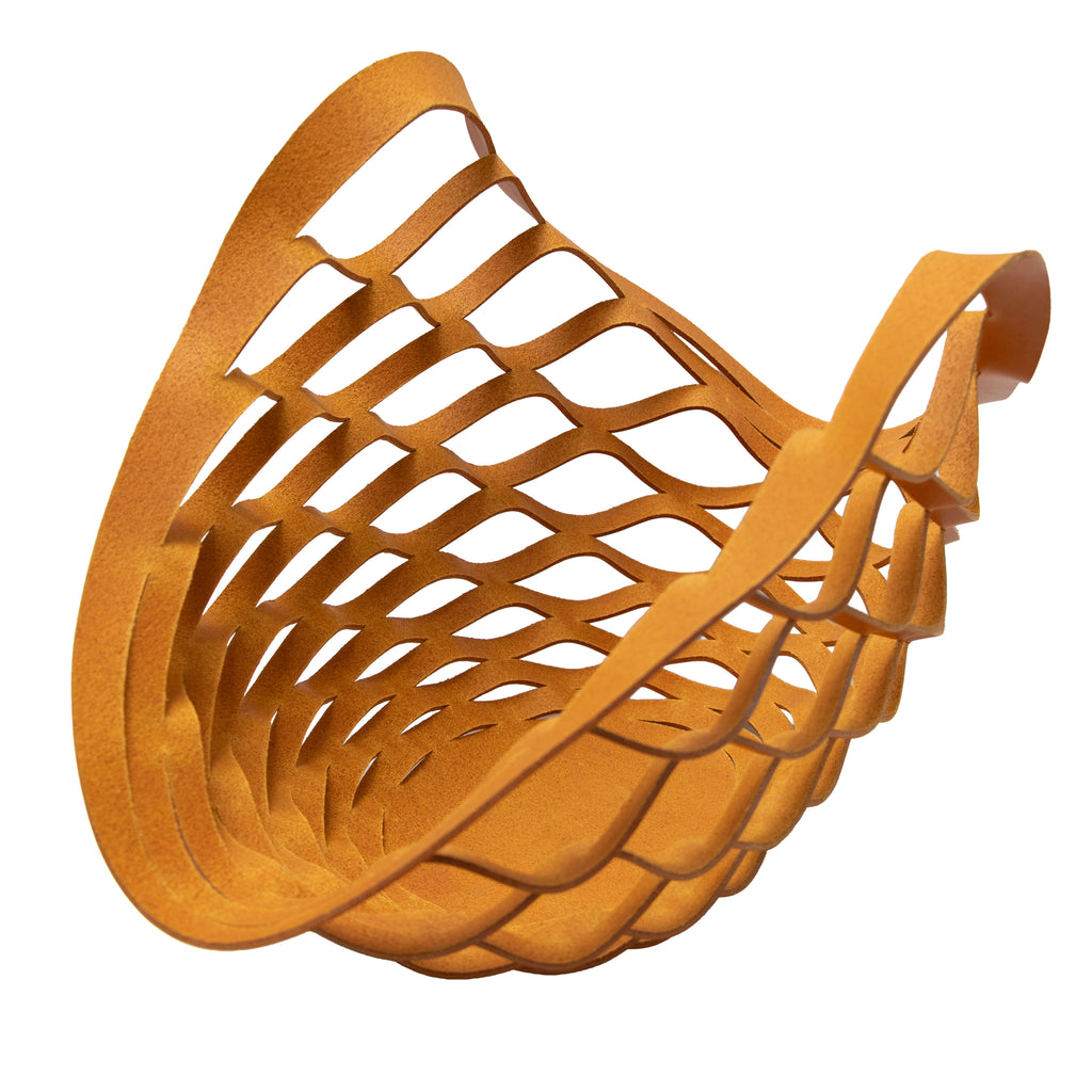 Yellow leather woven basket on a white background