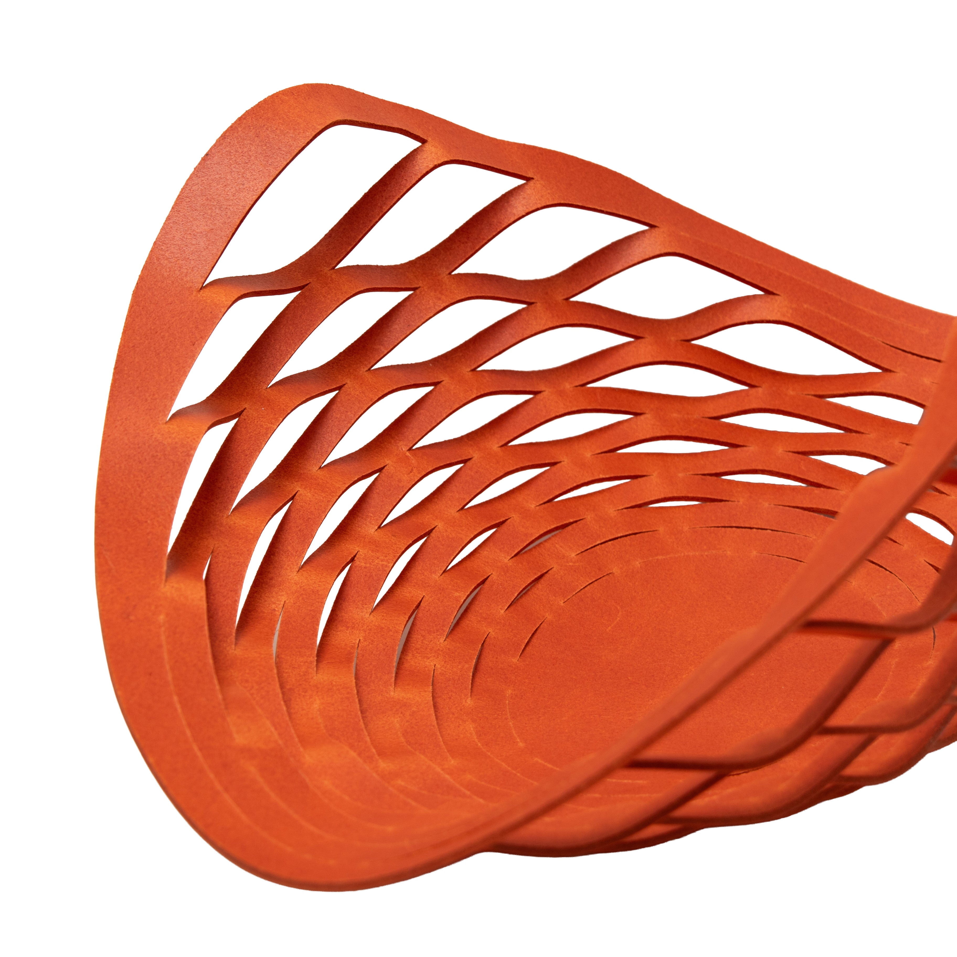 Orange leather woven basket on a white background