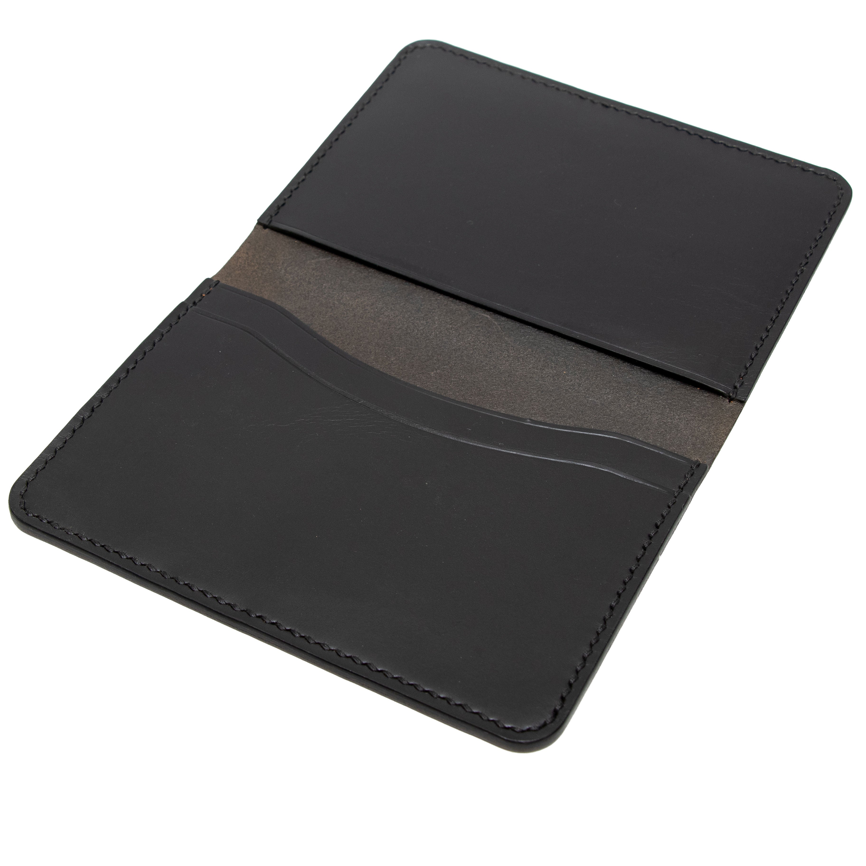 Black passport holder on a white background