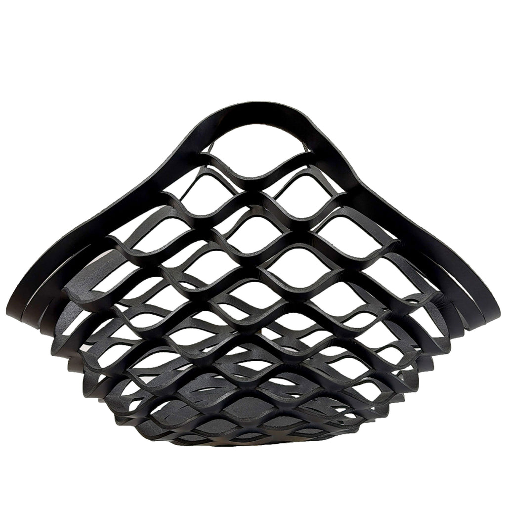 Black leather woven basket on a white background