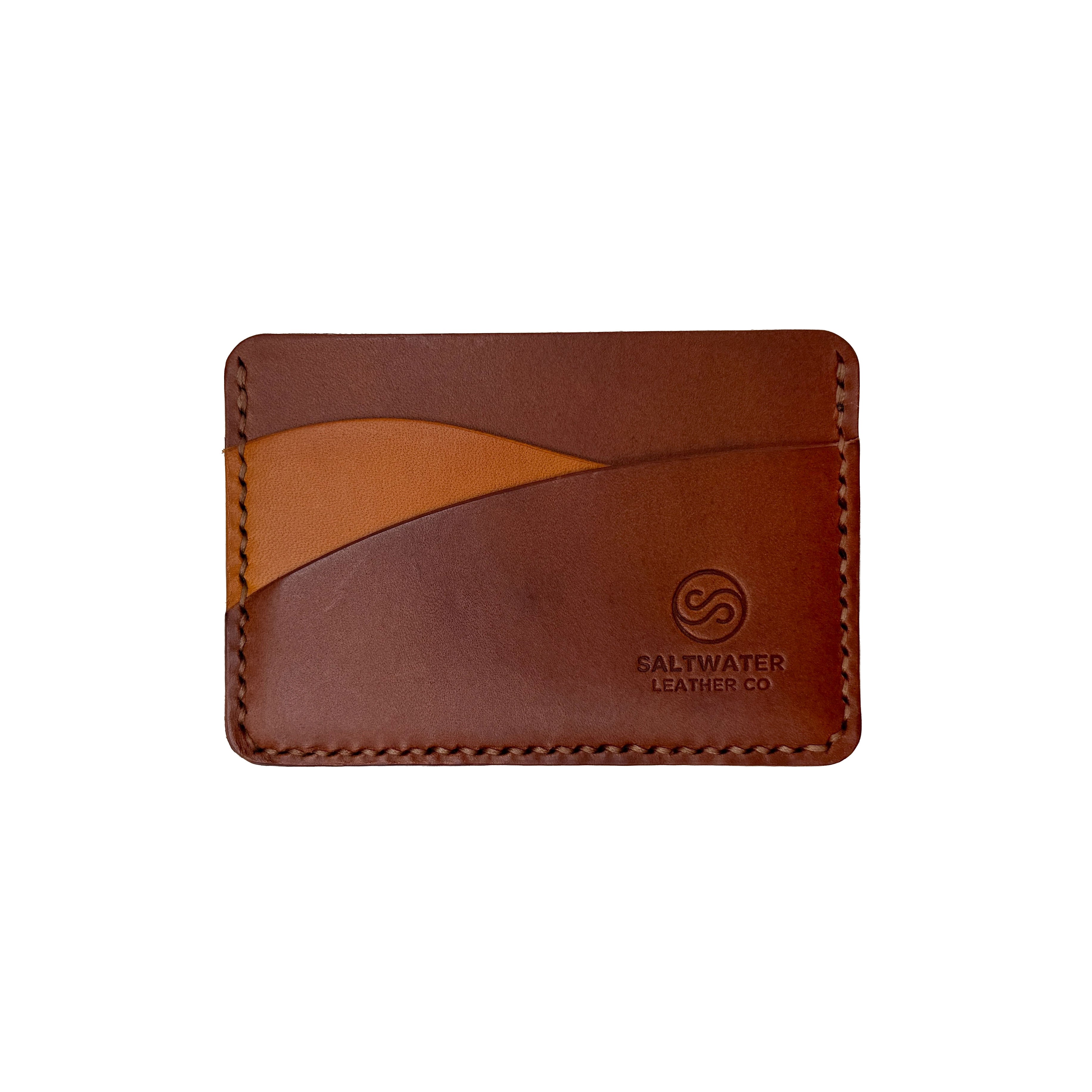 Brown leather cardholder with visible branding on a white background