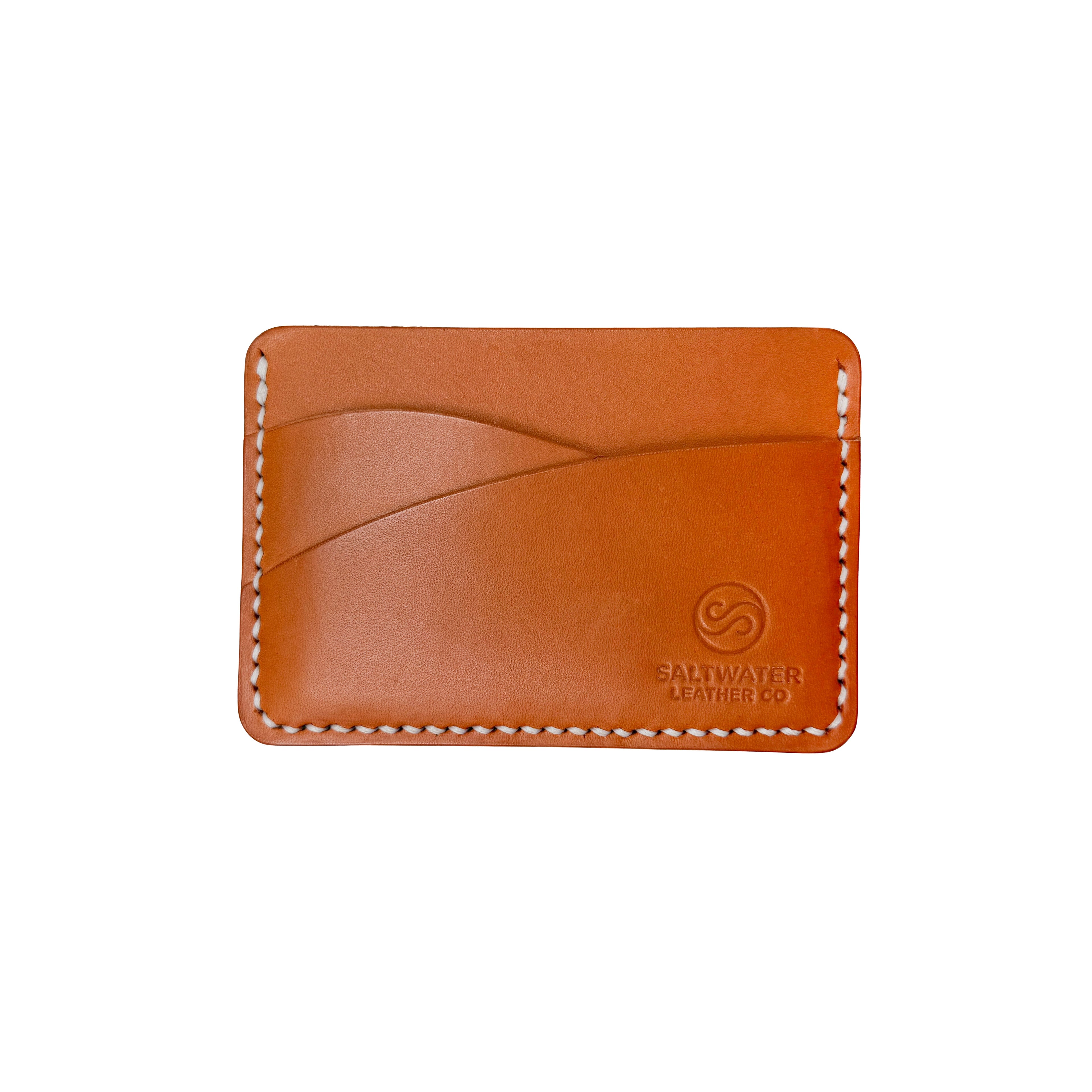 Brown leather cardholder with visible branding on a white background