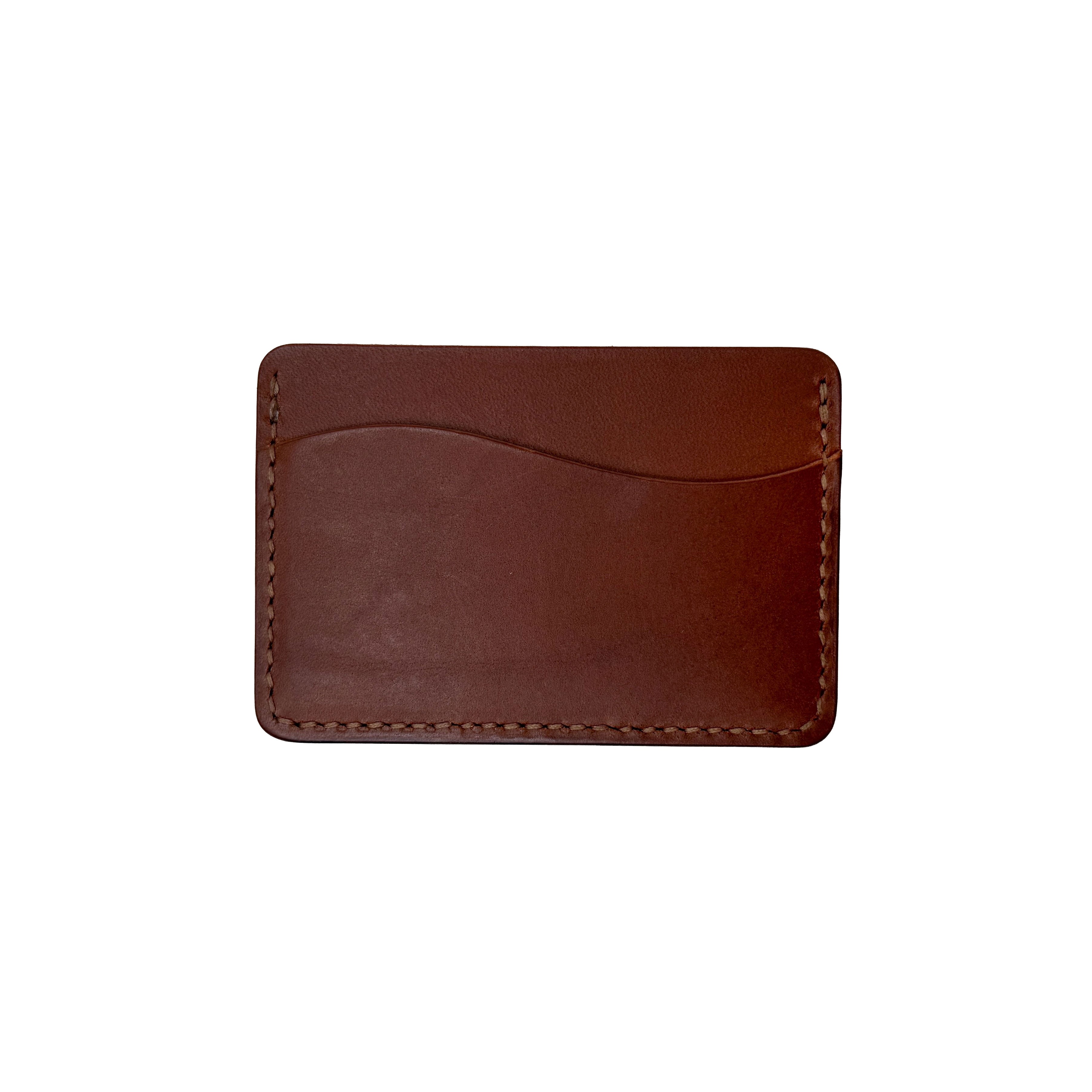 Brown leather cardholder on a white background