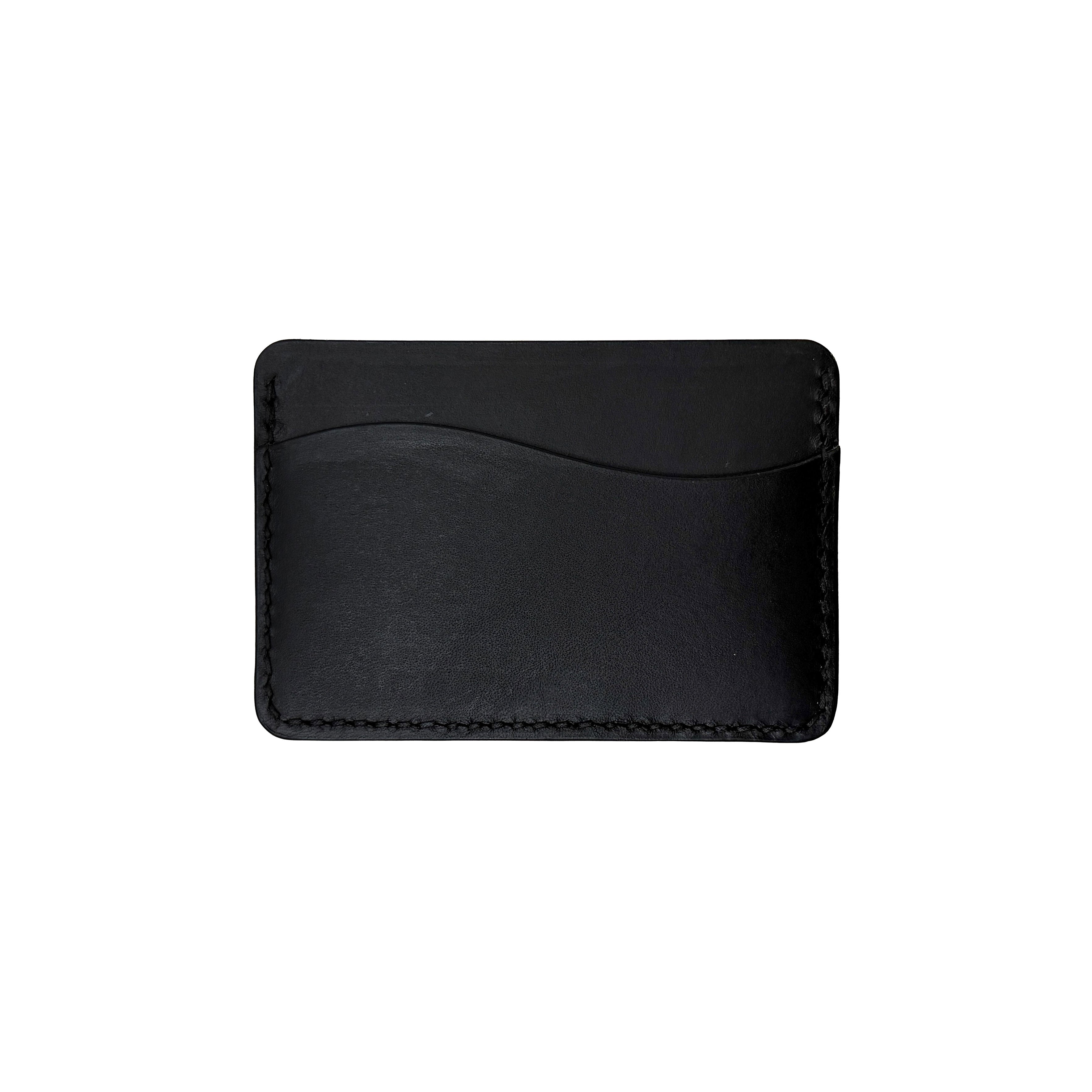Black leather cardholder on a white background