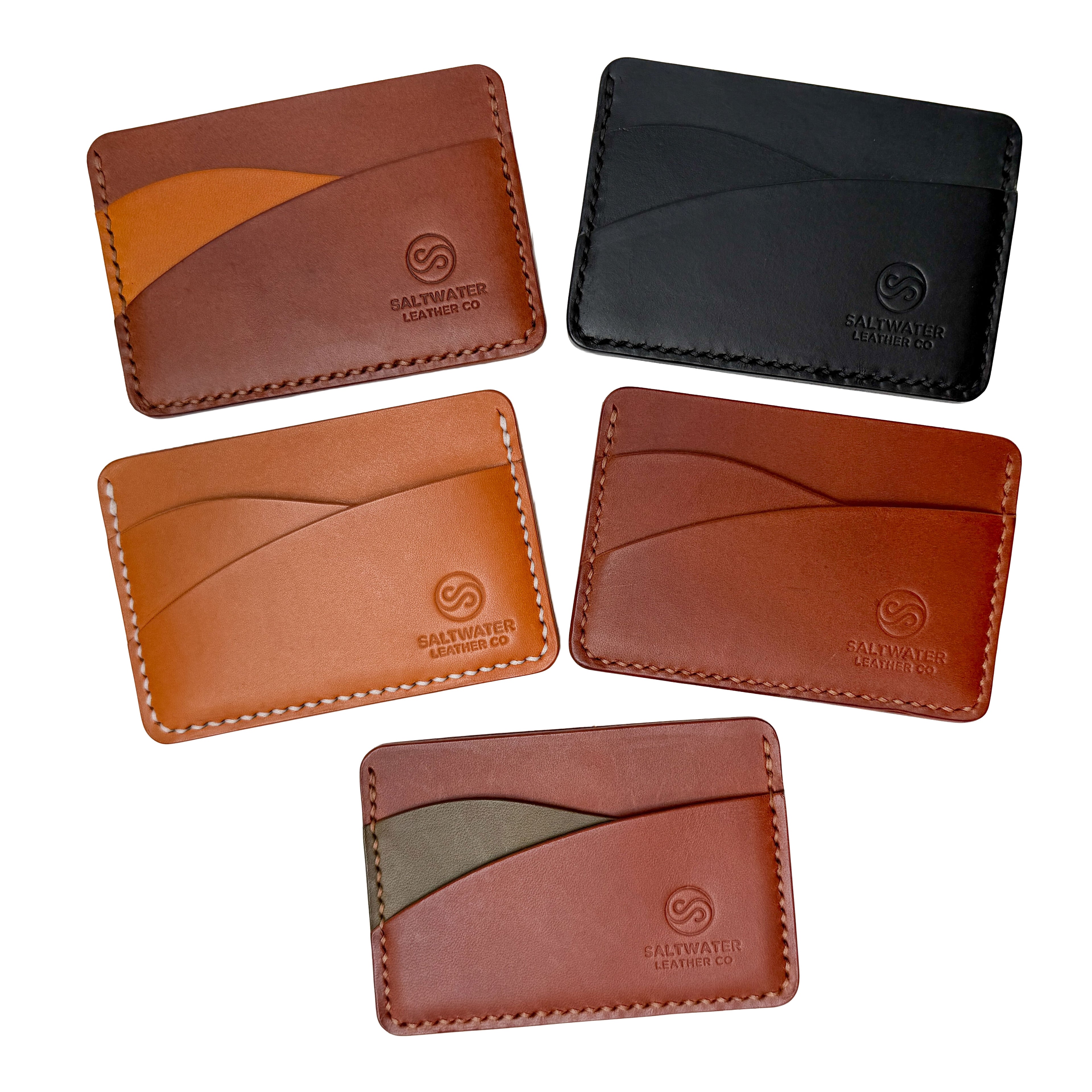 Set of five leather card holders in various colors on a white background