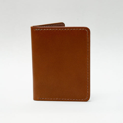 Brown leather wallet on a white background