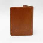 Brown leather wallet with 'Saltwater Leather' branding on a white background