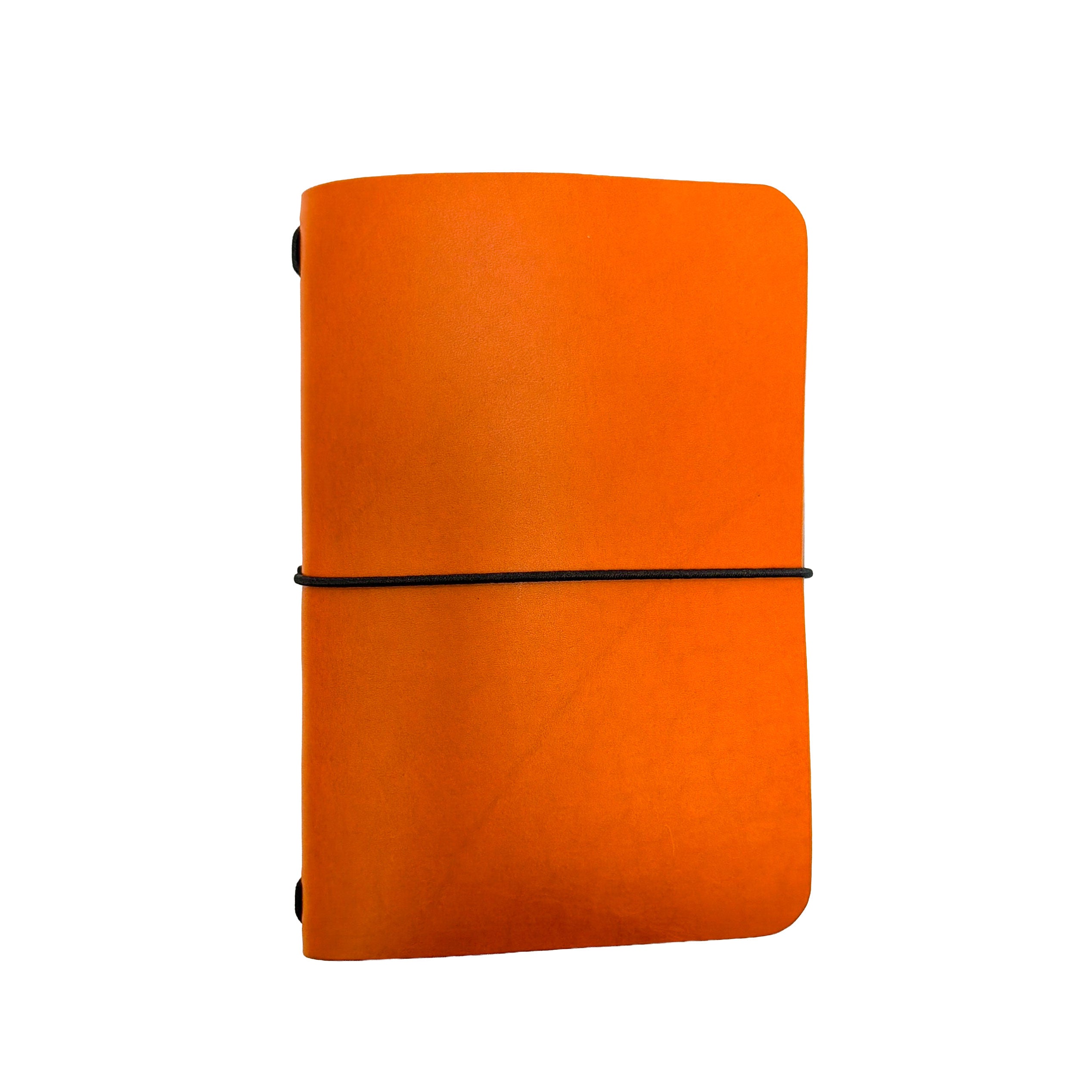 Saltwater Leather vegetable tanned leather journal cover in California Poppy orange with an elastic band closure, photographed against a white background.