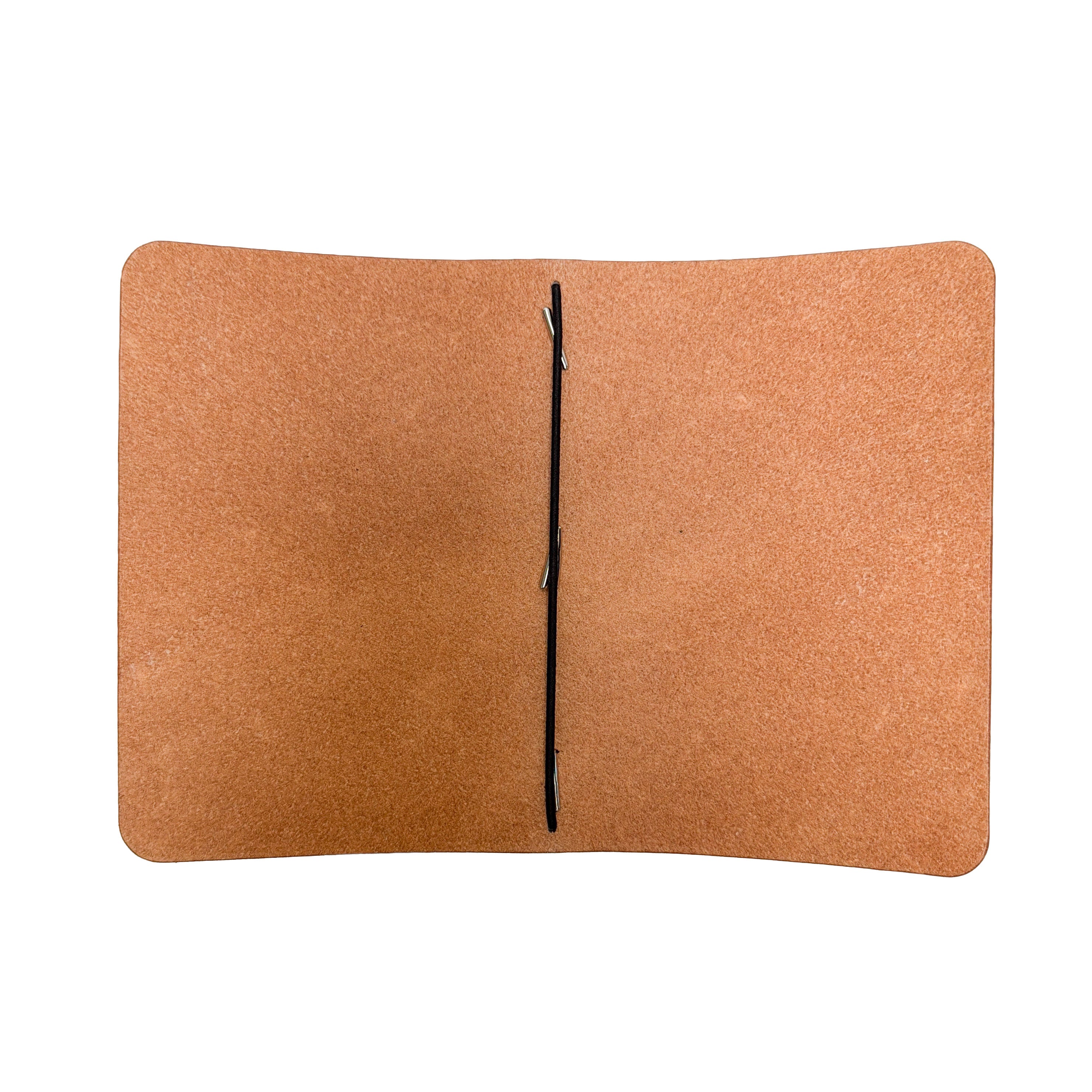 Interior of a Saltwater Leather natural color journal cover open against a white background.
