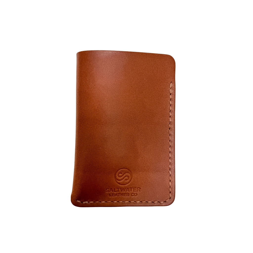 Brown leather wallet with a visible brand logo on a white background