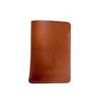 Brown leather wallet with a visible brand logo on a white background