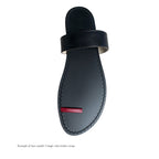 Black sandal with a single color leather strap on a white background