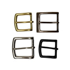 Four metal belt buckles in gold, bronze, silver, and black on a white background
