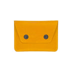 Yellow wallet with two black buttons on a white background