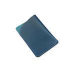 Blue leather cardholder on a white background