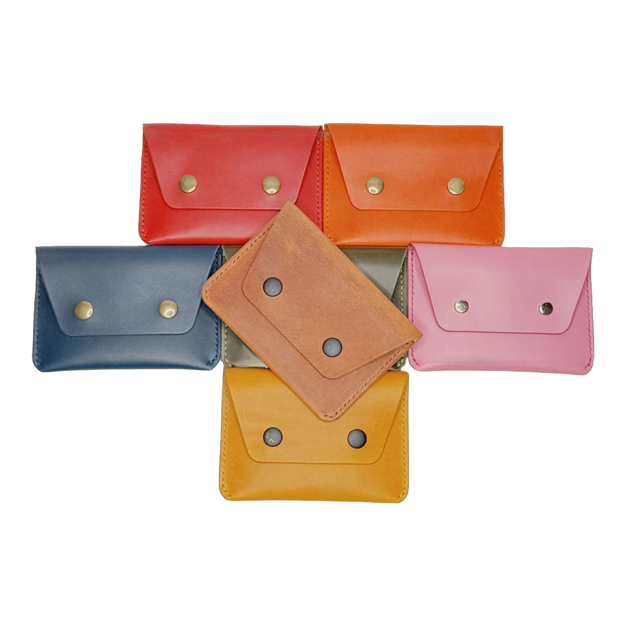 Set of colorful leather wallets on a white background