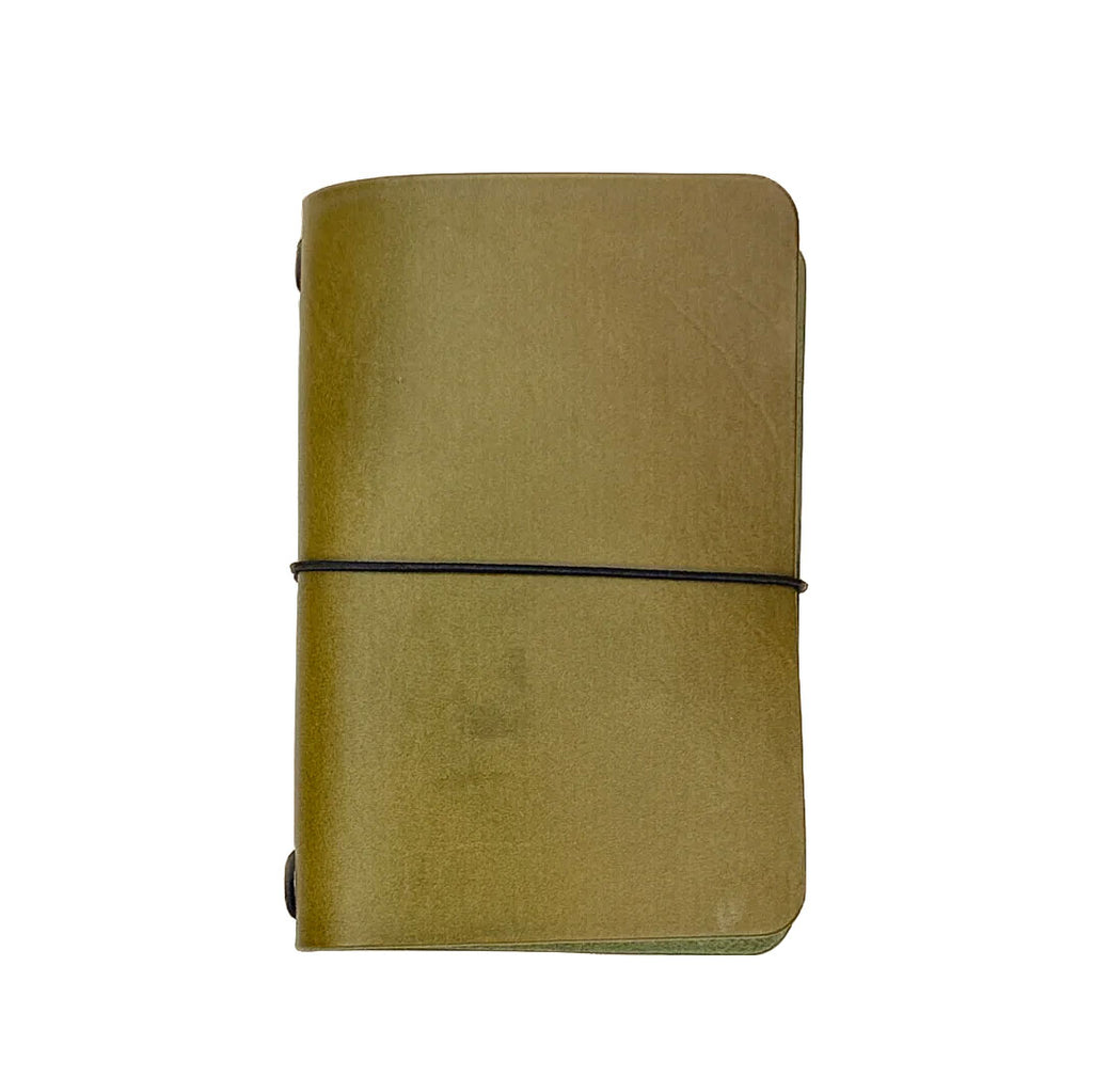 Saltwater Leather vegetable tanned leather journal cover in Olive green with an elastic band closure, photographed against a white background.
