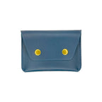 Blue leather wallet with yellow buttons on a white background